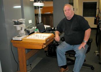 Cecil Smith, Associate Curator and Collections Manager for the UGCA, sitting in the Arthropods collection room in 2009.